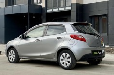 Mazda Demio 2012 года серая вид сзади